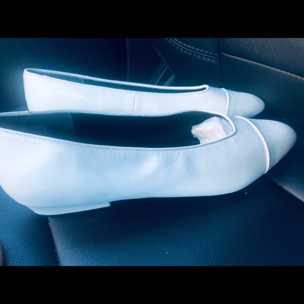 White flat shoes